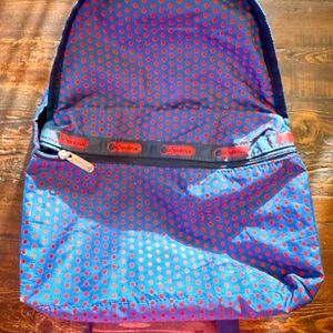 Lesportsac Blue and Red Reflective Backpack
